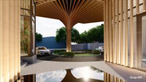 A modern architectural drop-off area with a distinctive wooden canopy structure, surrounded by greenery. A few cars are parked in the background.